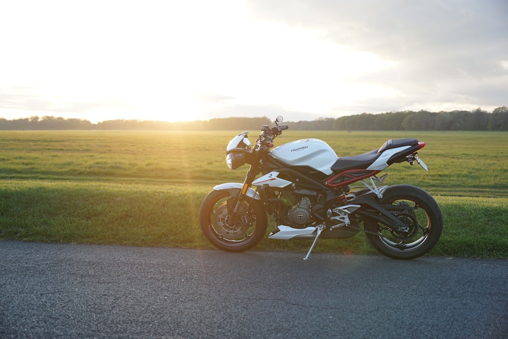 a motorcycle parked on the side of the road