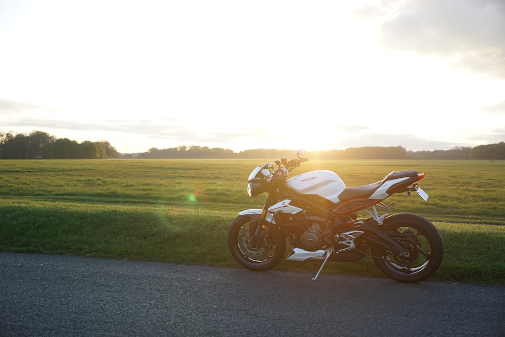 a motorcycle parked on the side of the road