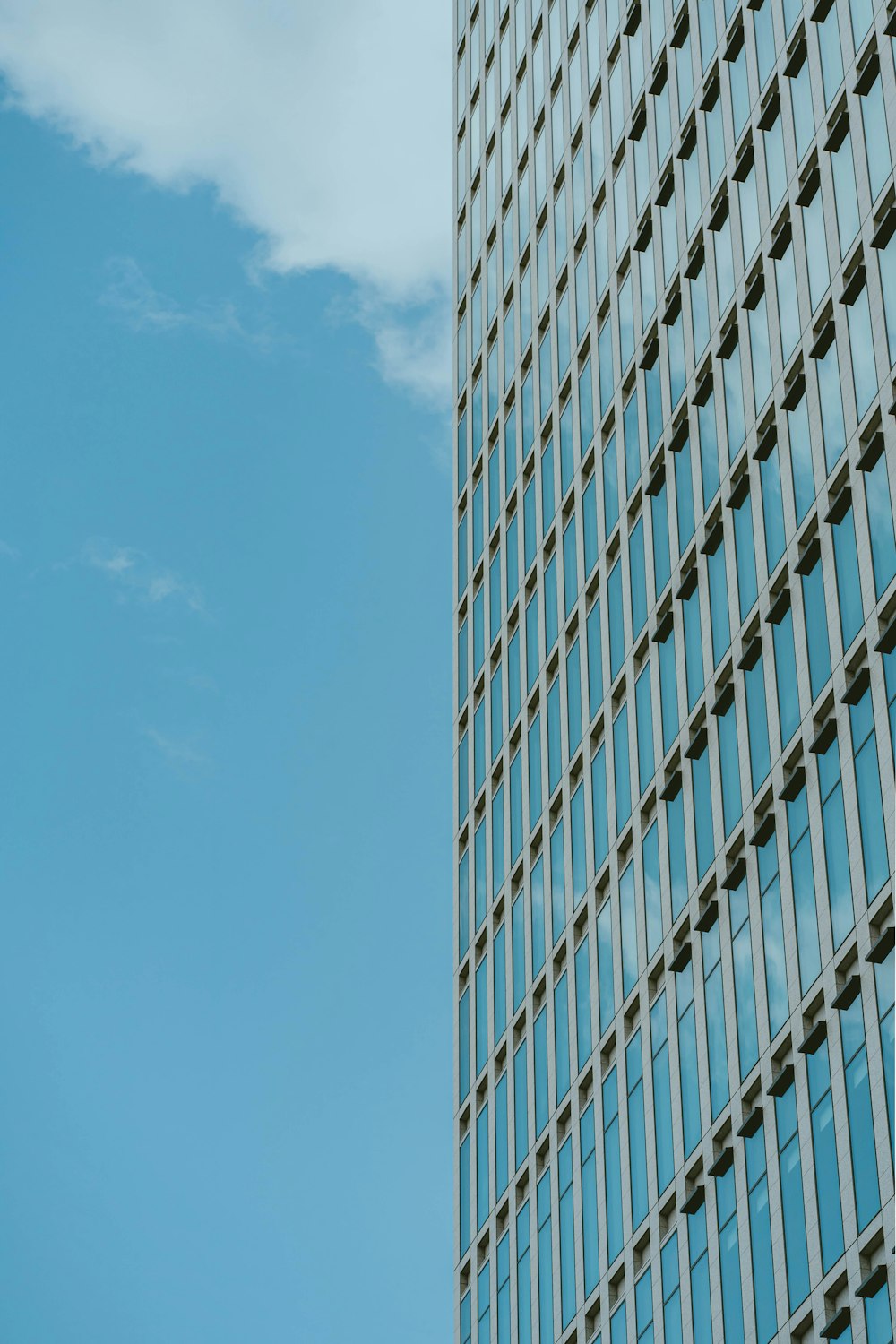 a very tall building with a sky in the background