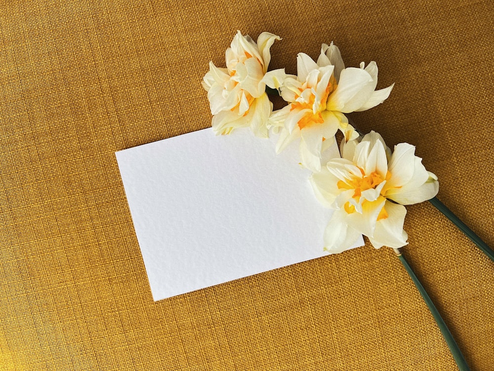 a piece of paper with some flowers on it