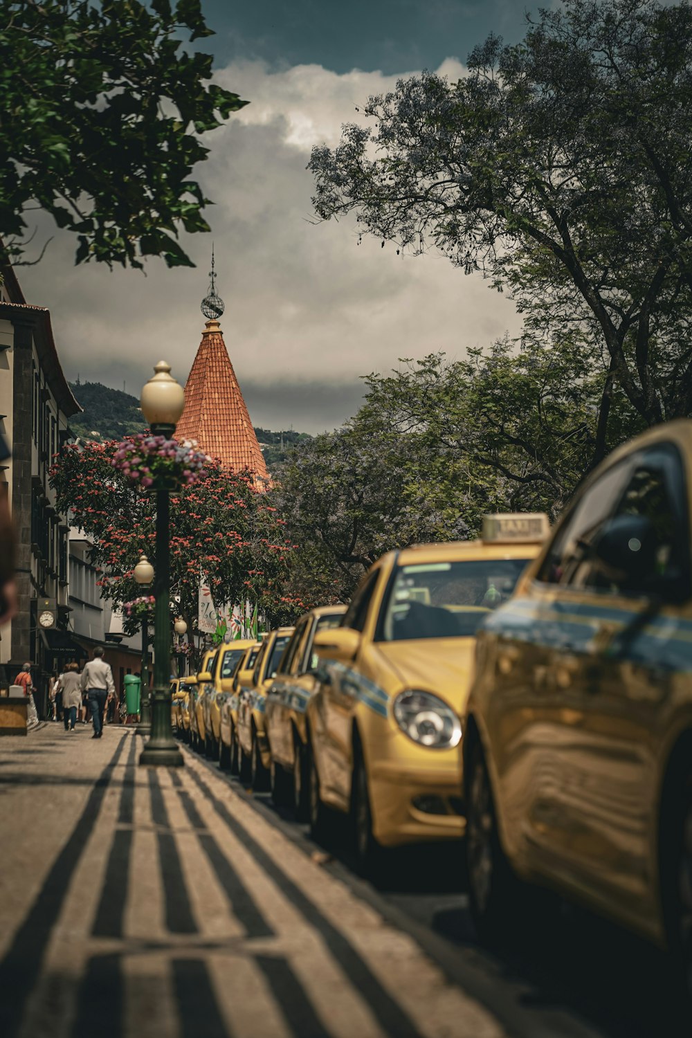 a row of parked cars on a city street