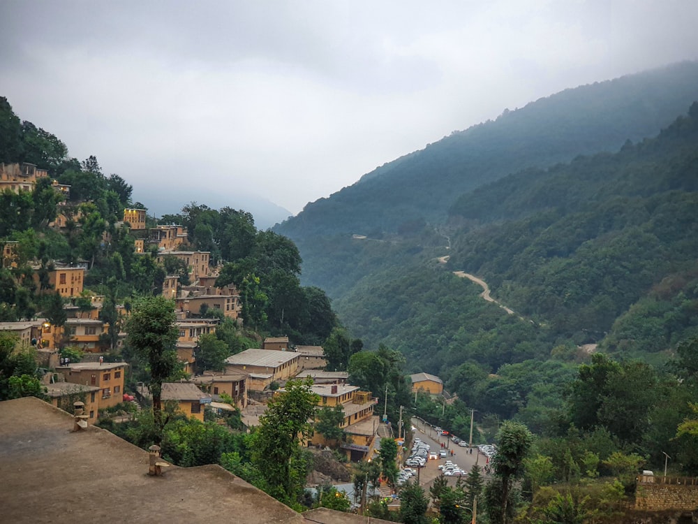 a view of a village in the mountains