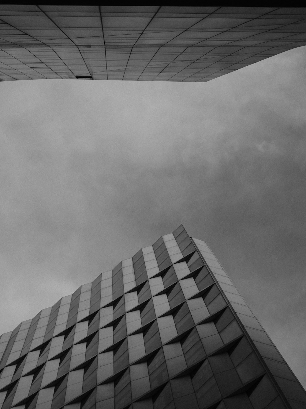 a black and white photo of a tall building