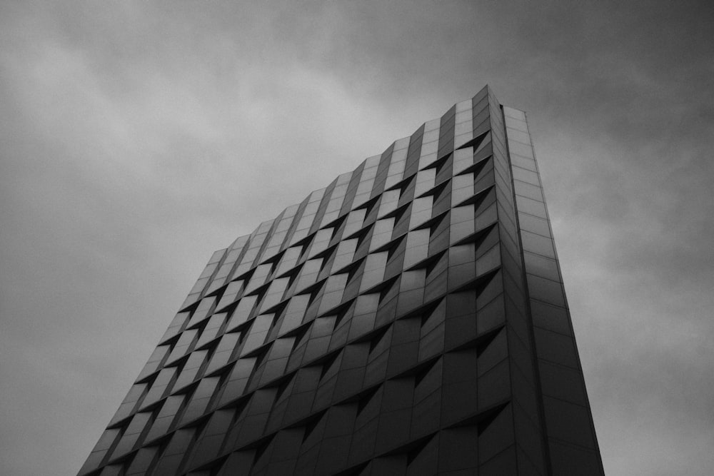 a black and white photo of a tall building