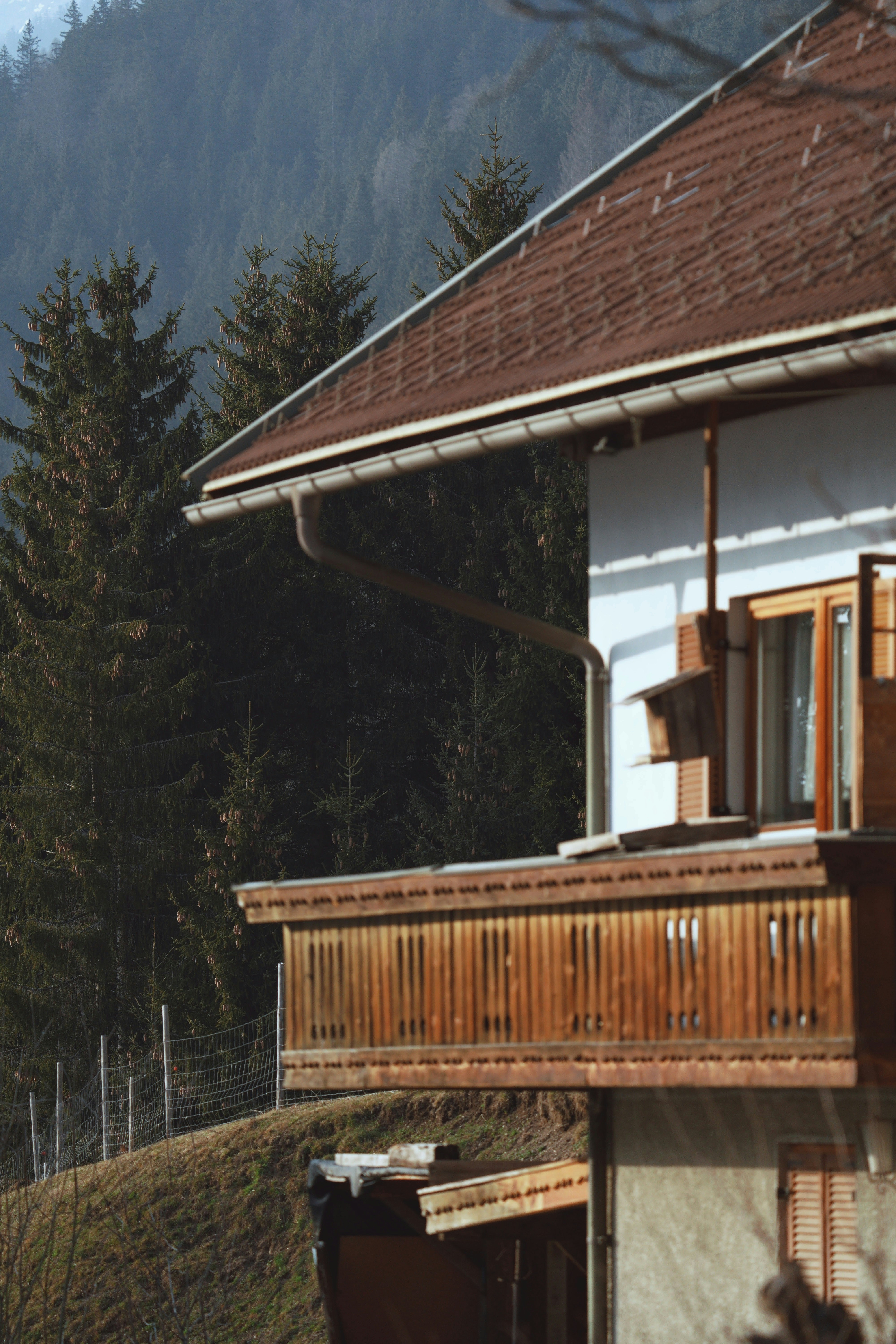 a house with a mountain in the background