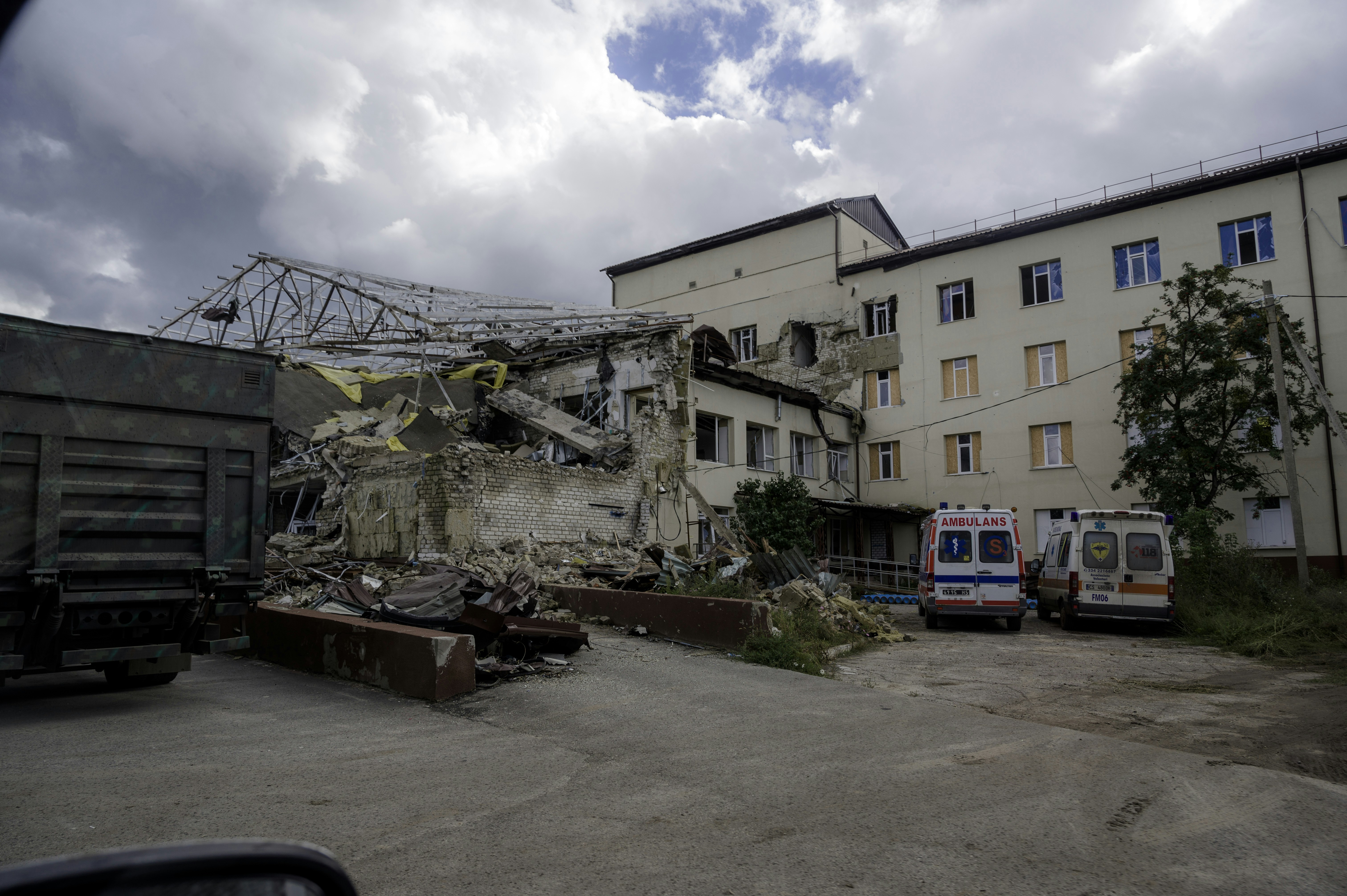 a building that has a bunch of rubble in front of it