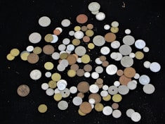 An image of a diverse group of numismatists discussing coins.