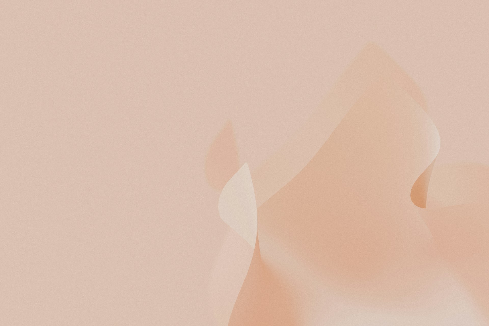 a pink background with a blurry pattern