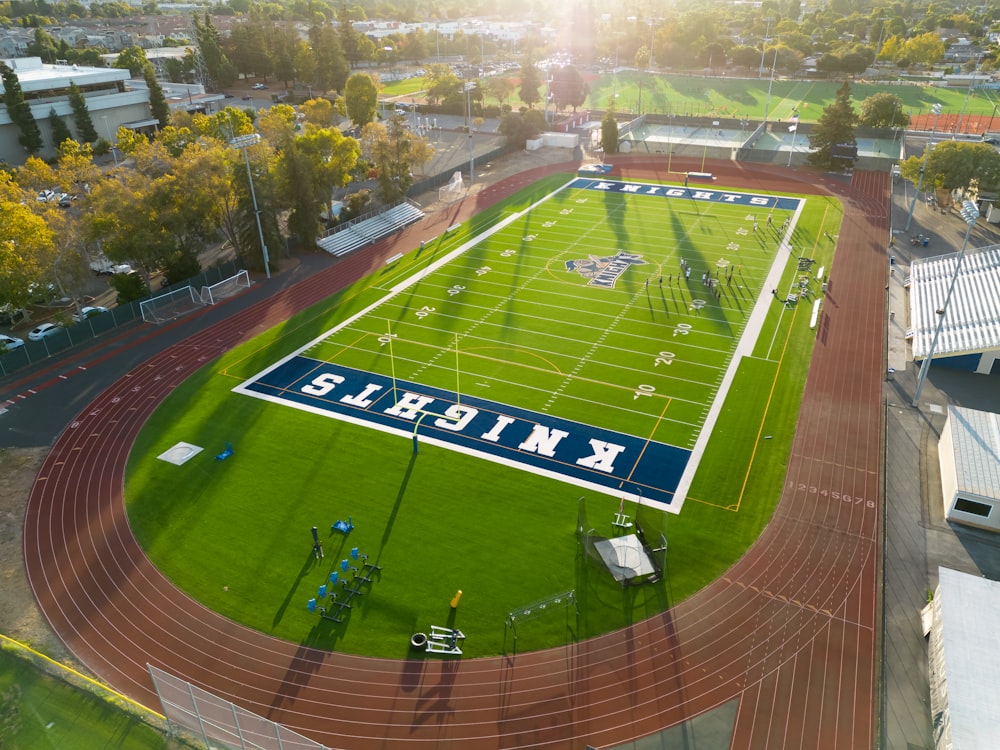 an aerial view of a soccer field with a sky background