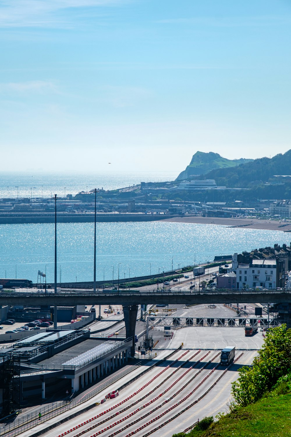 a bridge over a body of water with a train on it