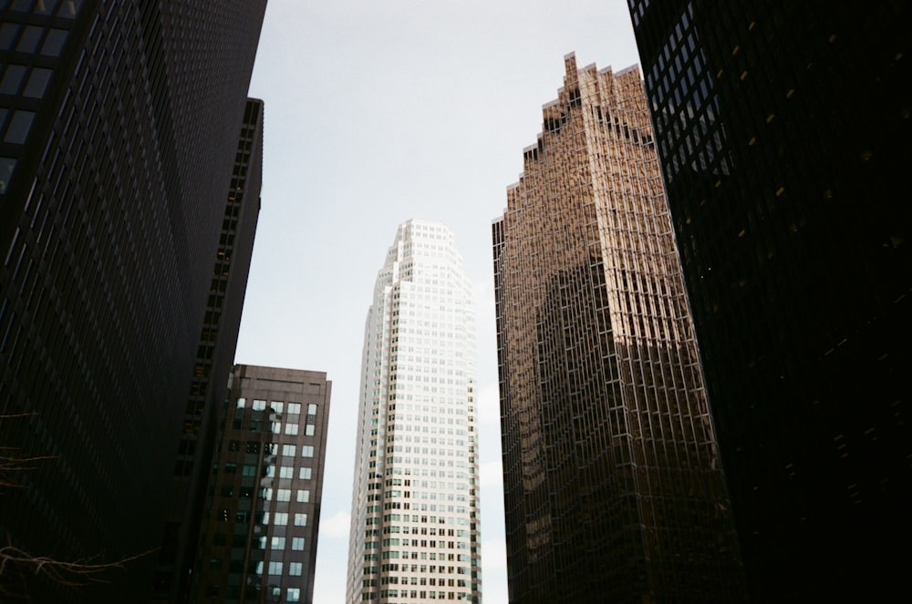 a group of tall buildings sitting next to each other