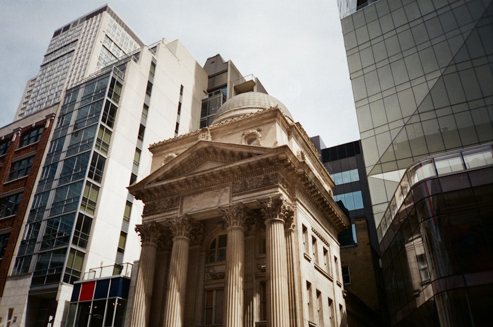 a tall building with a dome on top of it