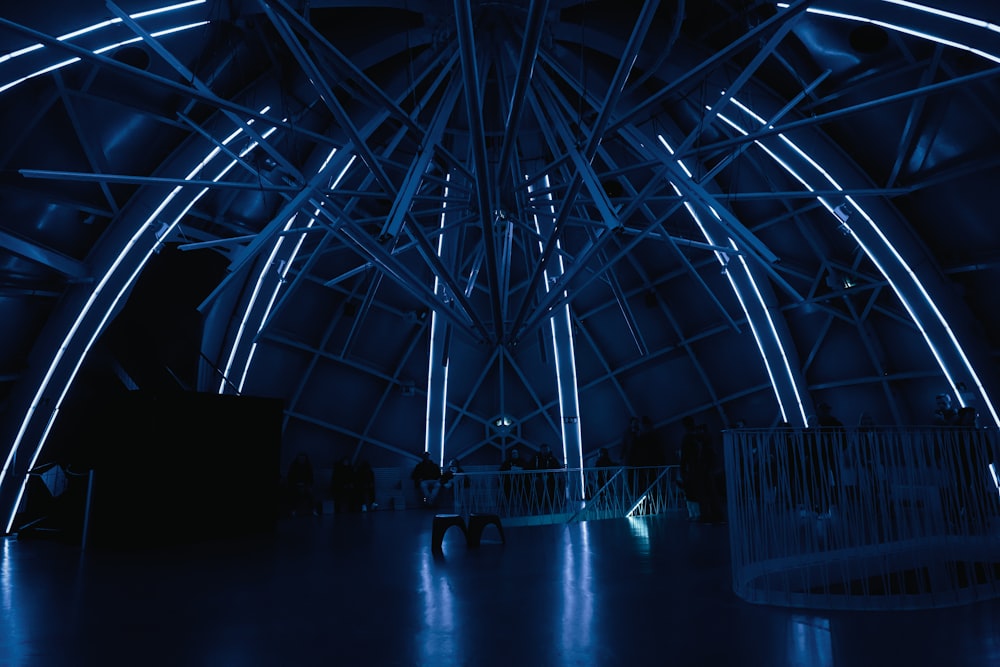 a dark room with a large metal structure