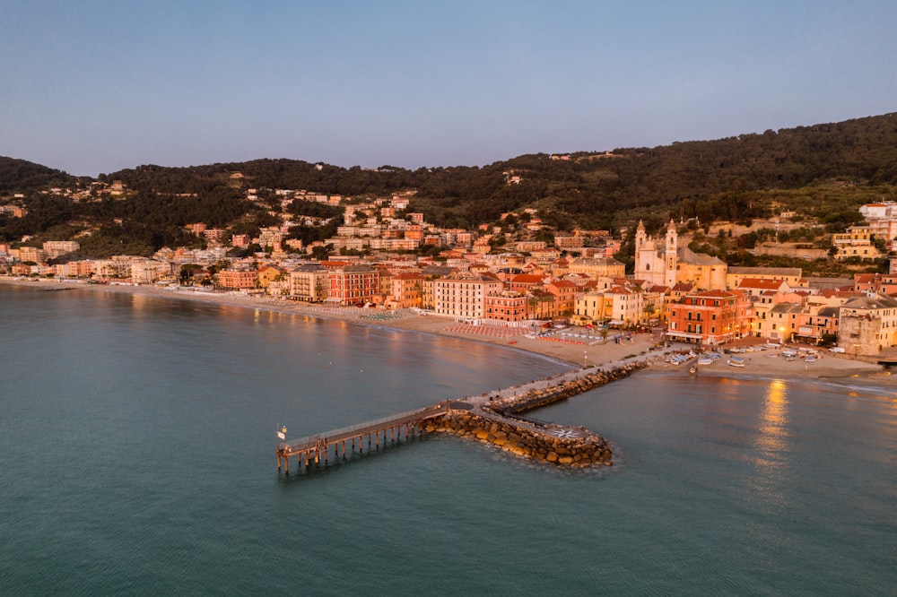 an aerial view of a city on the water