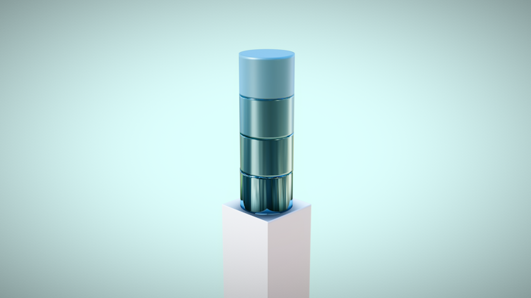 A stylized 3D-rendered object resembling stacked translucent cylinders in varying shades of blue and green, positioned vertically on a white pedestal against a light teal background.