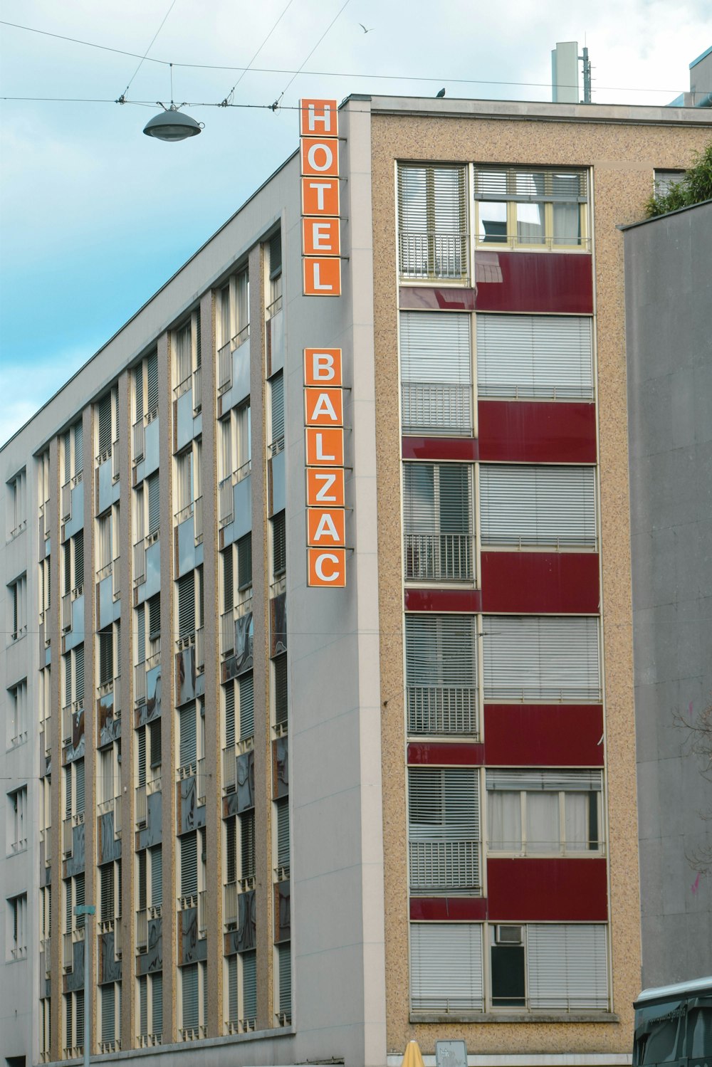 a hotel sign on the side of a building