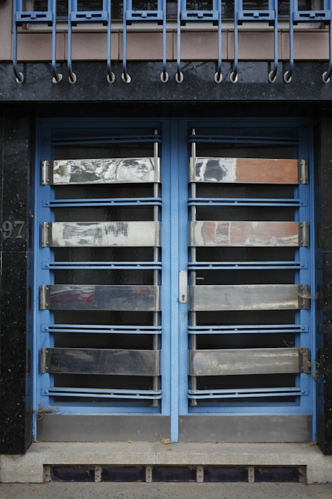 Modern steel door installed on a residential building entrance