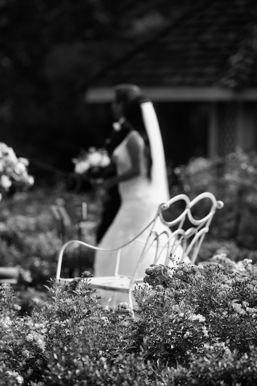 a black and white photo of a bride and groom