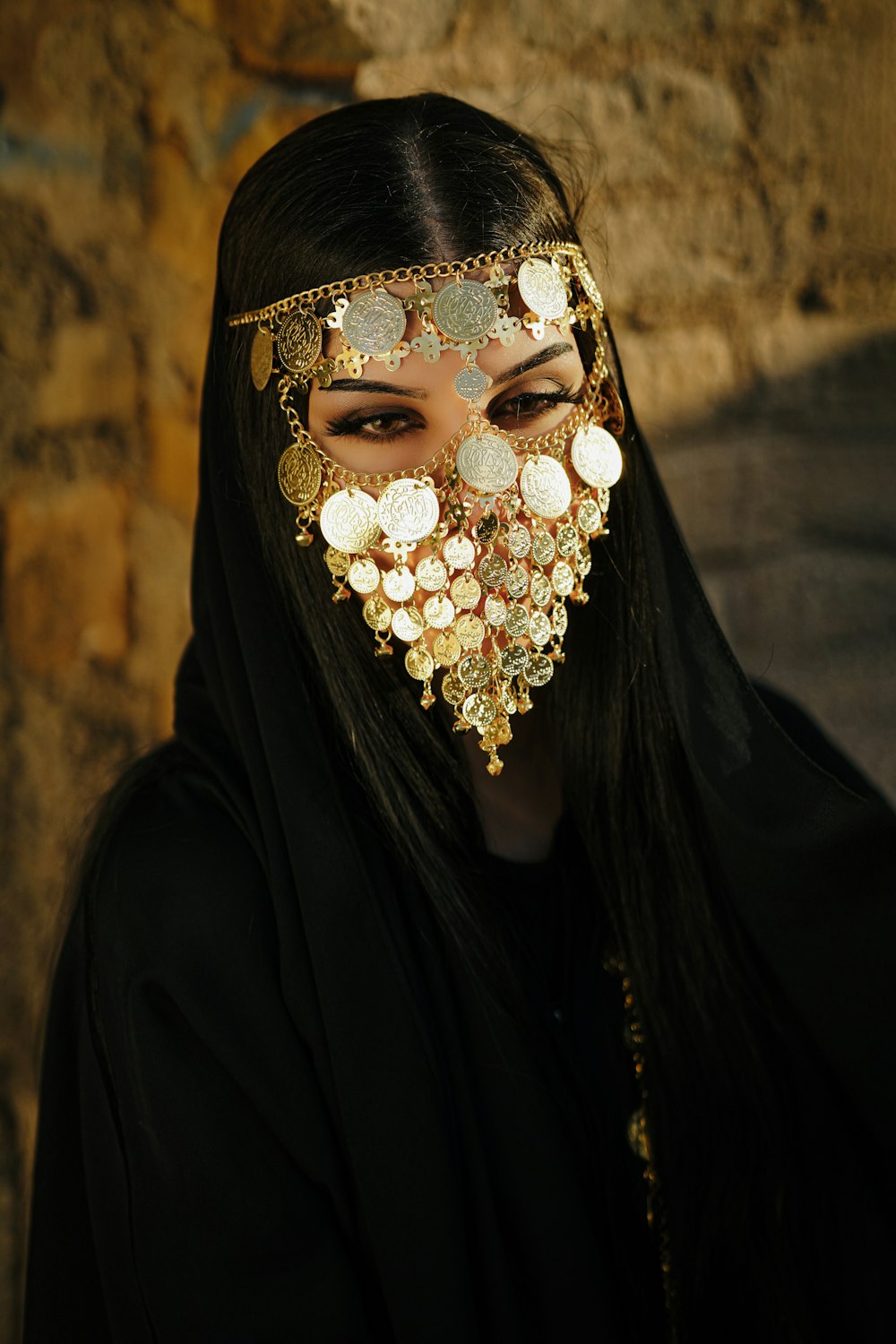 a woman wearing a mask with buttons on it