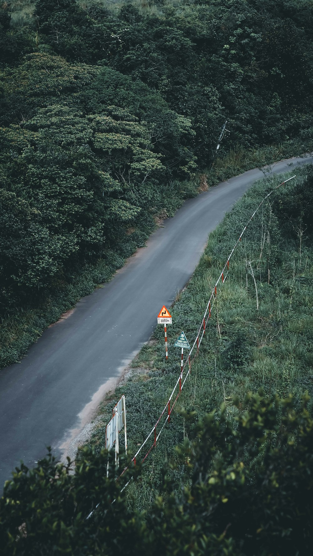 a road with a sign on the side of it