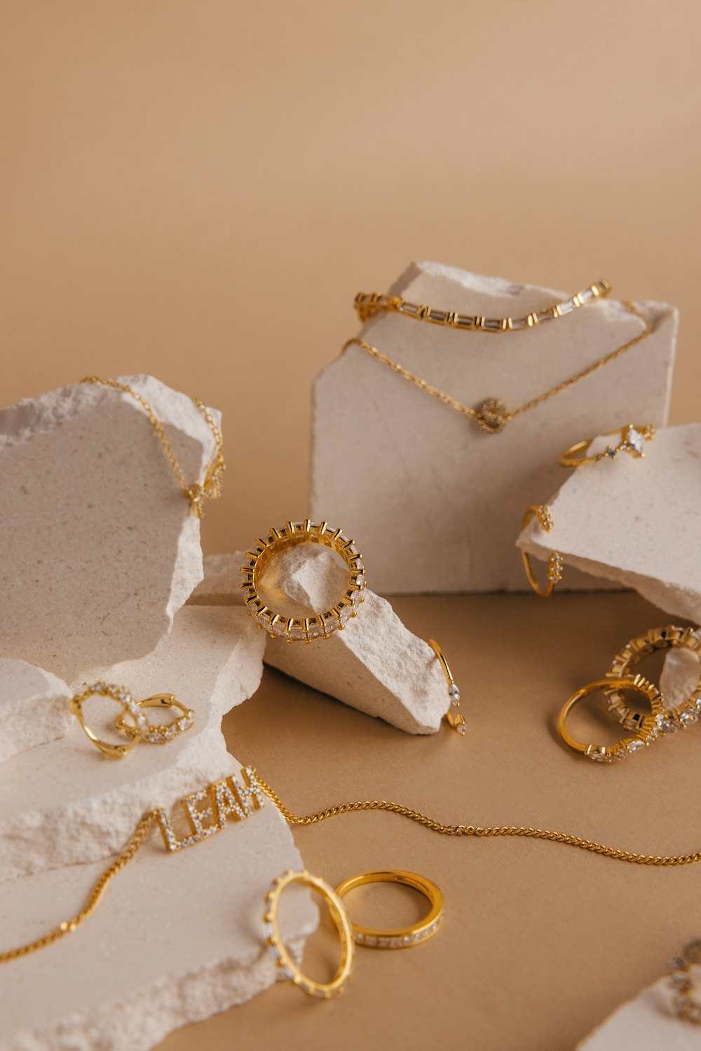 a bunch of jewelry sitting on top of a table