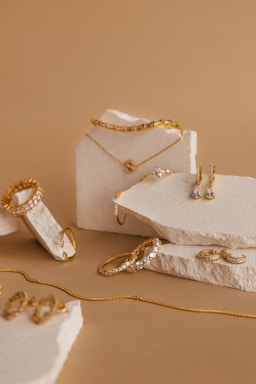 a bunch of jewelry sitting on top of a table