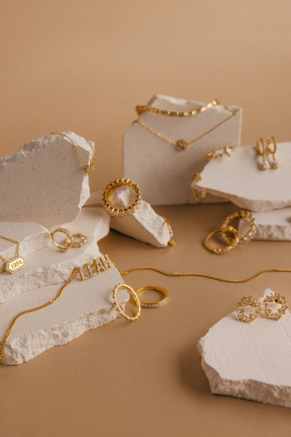 a bunch of jewelry sitting on top of a table