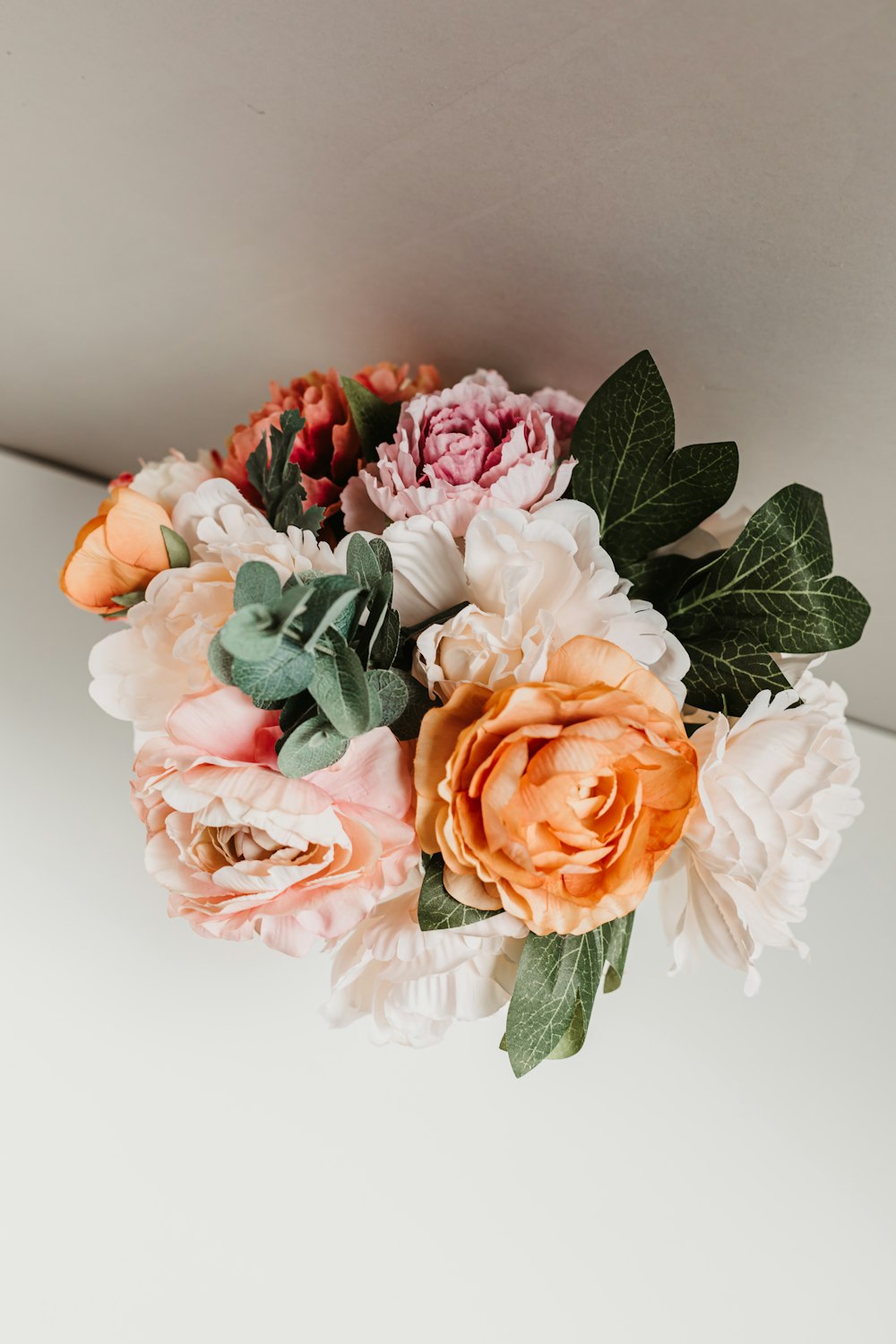 a bouquet of flowers sitting on top of a table