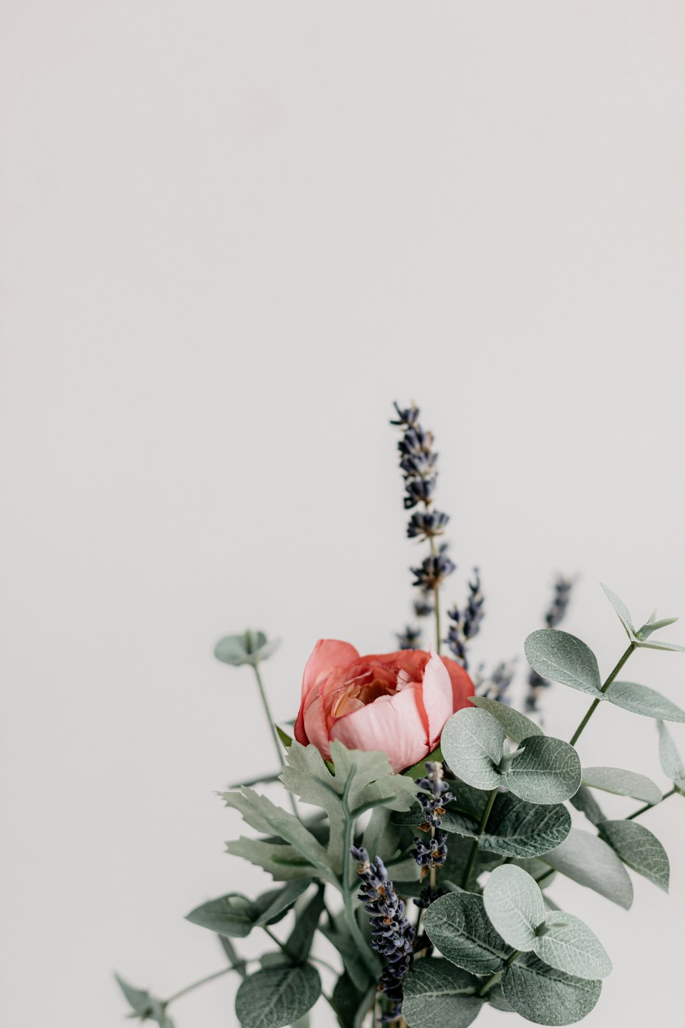 a vase filled with flowers on top of a table