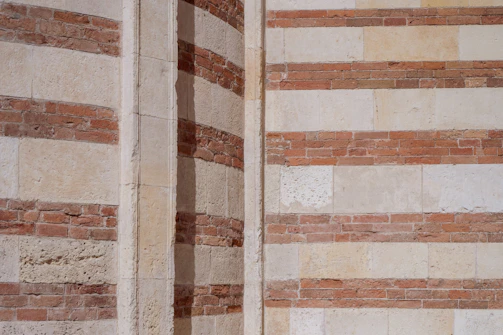 Close-up of a textured exterior wall design showcasing durable materials and fine craftsmanship.