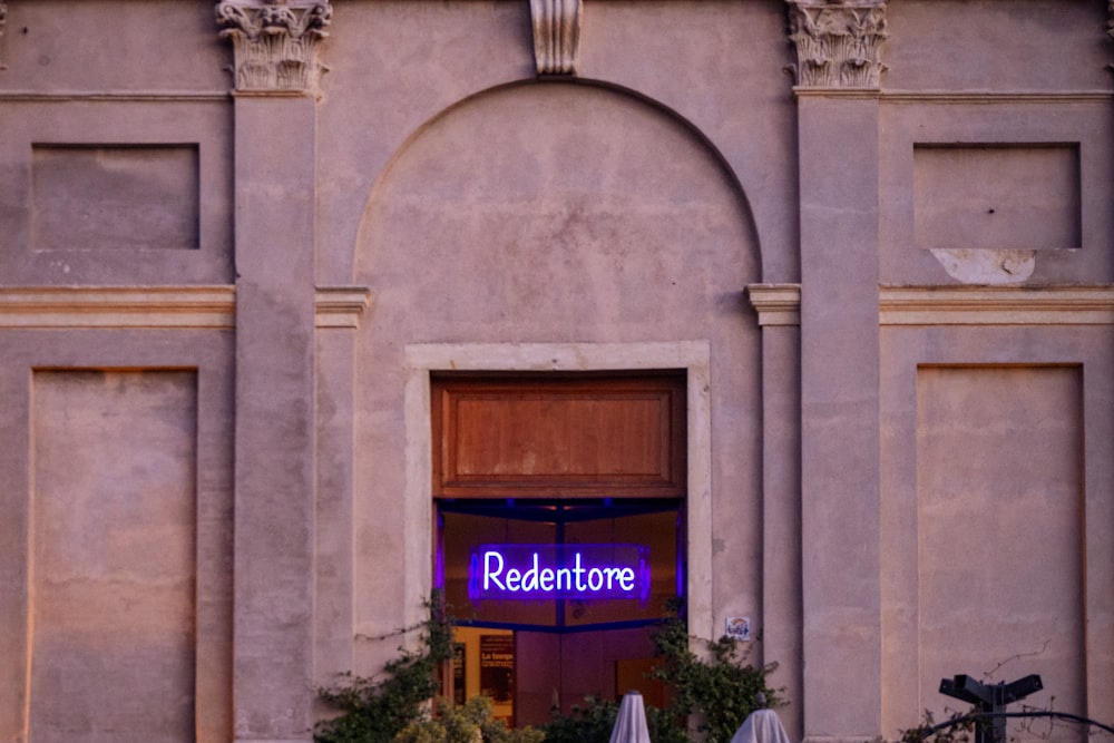 a building with a sign that reads redentone on it