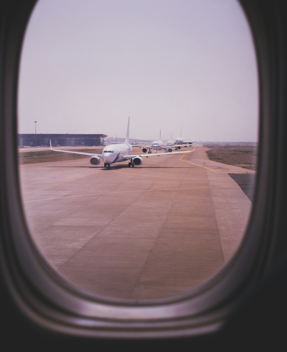 a view of an airplane from inside a window