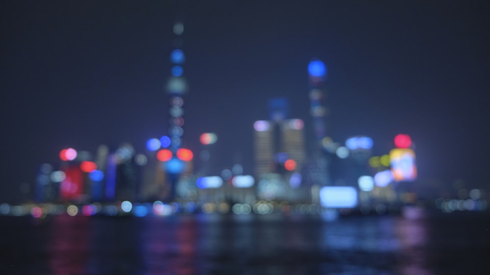 a blurry photo of a city at night