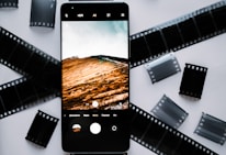 Close-up of cinematic phone screen with a dramatic scene in vibrant colors.