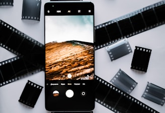 a cell phone with a film strip around it