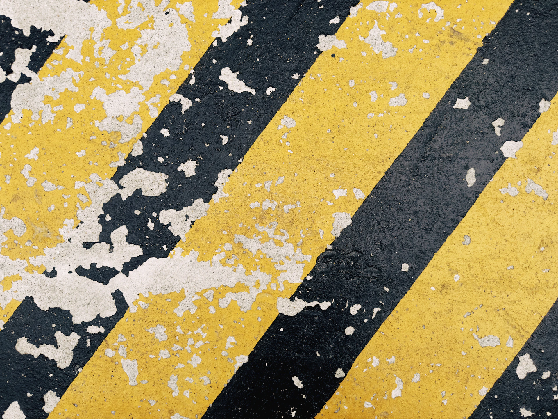 a close up of a yellow and black striped floor