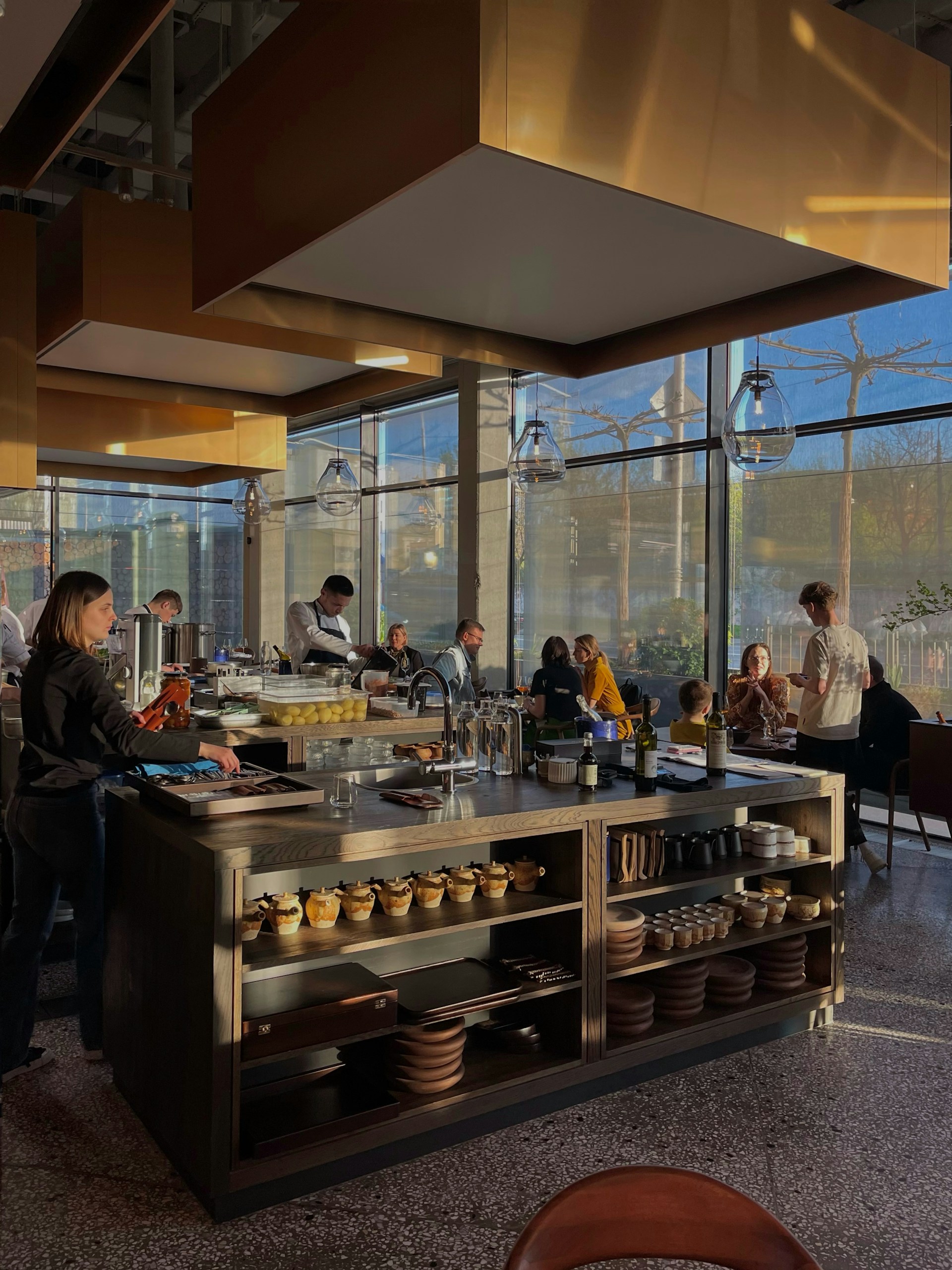 woman wearing yellow long-sleeved dress under white clouds and blue sky during daytime