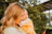 a woman holding a baby in her arms