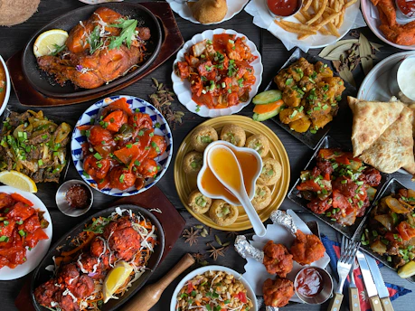 a table filled with lots of different types of food