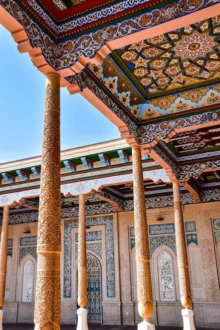 a building with columns and a tiled roof