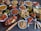 A beautifully arranged buffet spread featuring colorful traditional Indian cuisine.