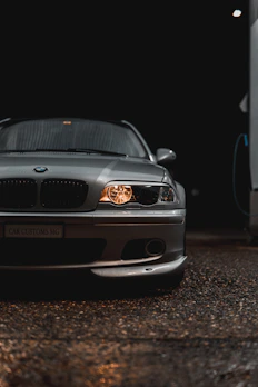 A sleek car shining under natural light, showcasing its polished exterior.