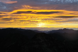 A breathtaking view of a scenic hill station at sunset.