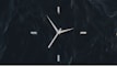 A minimalist clock design against a bright background.