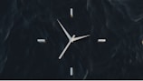 A stylish clock featuring a modern design and rich colors.