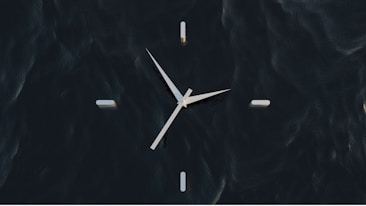 A minimalist clock set against a dark, textured background that resembles water. The clock hands are designed in a modern style with sleek, sharp edges, and the hour markers are simple rectangular shapes.