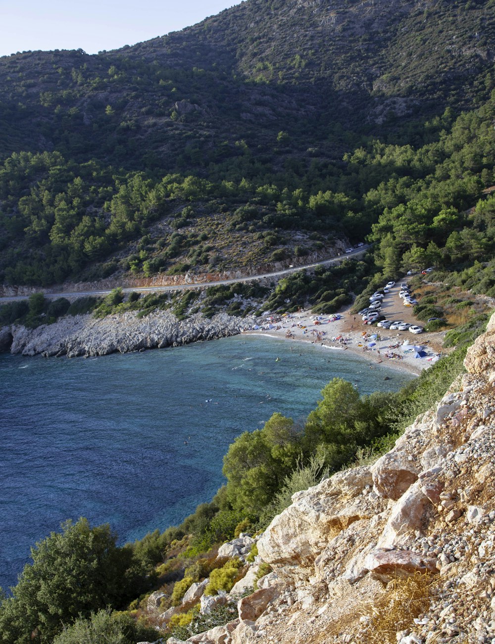 a view of a beach from a cliff