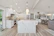 Spacious gourmet kitchen with modern appliances and a large island ready for meal prep.