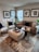 A cozy living room featuring beautifully upholstered furniture.