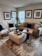A beautifully arranged living room with a comfortable sofa and decorative pillows.